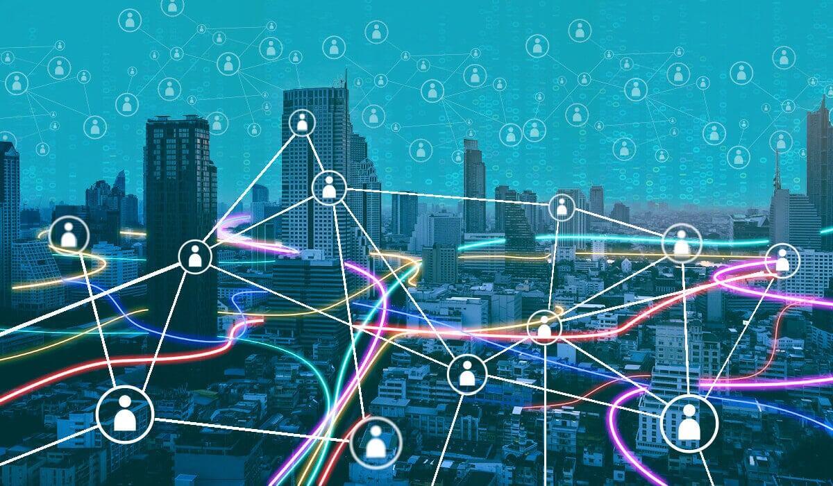 A teal skyline with neon paths connecting people to businesses in the skyline, representing Visier Business Solutions